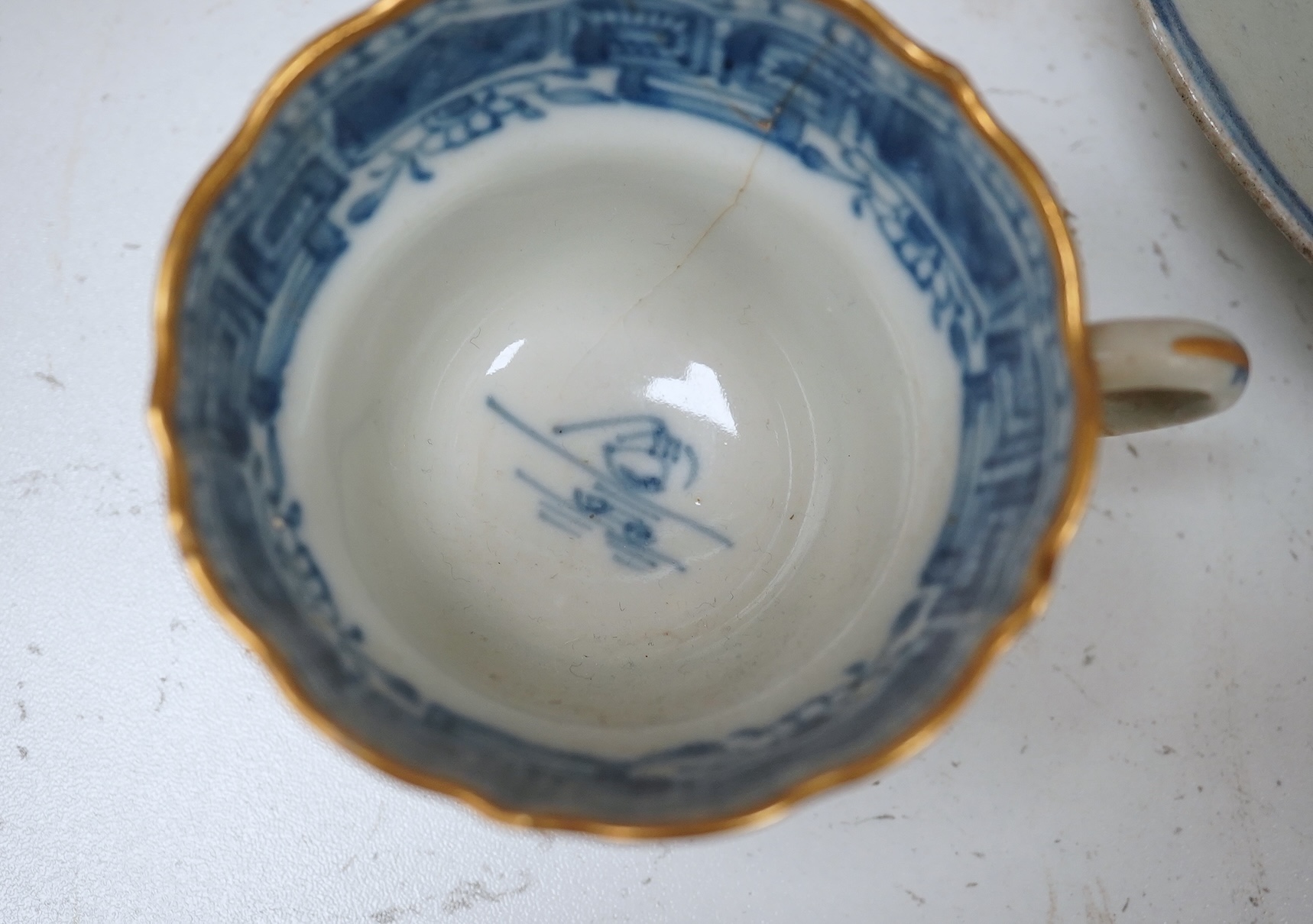 A Worcester teapot, c.1770, an 18th century Chinese famille rose and a blue and white dish, a small blue and white dish, a cup and saucer and teapot, largest dish 39cm (7). Condition - most damaged, cracked or chipped